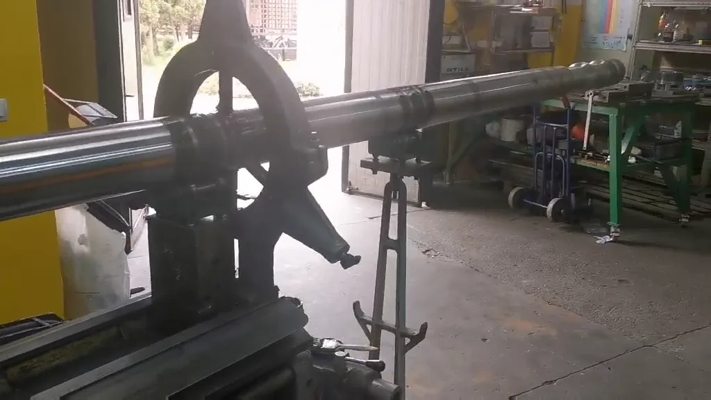 The Steel Industry workshop — lathe work on a shaft